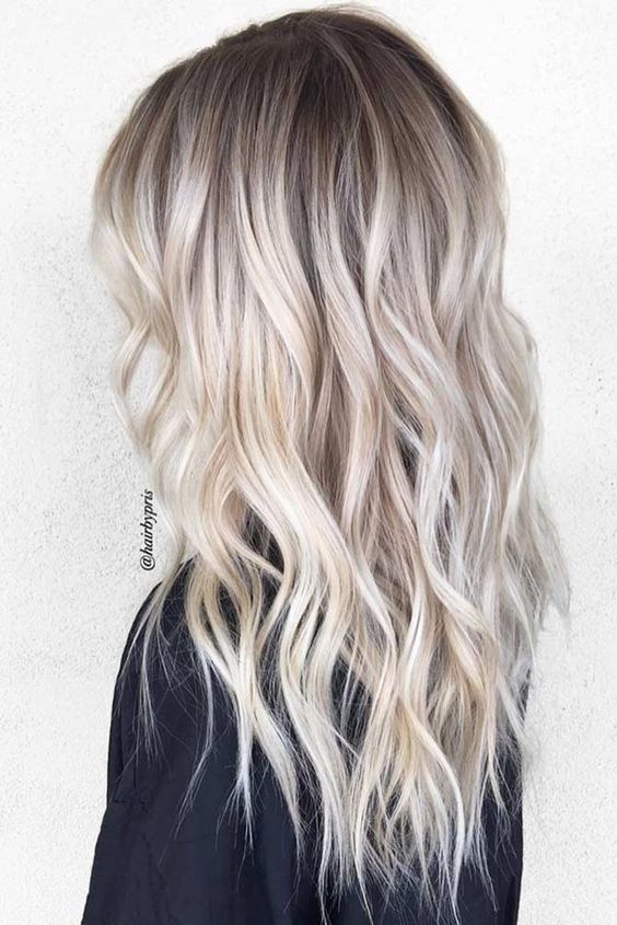 long blonde haircut curls celebrity hairstyle