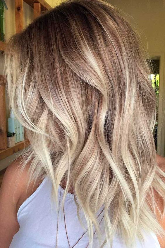 long blonde haircut curls celebrity hairstyle